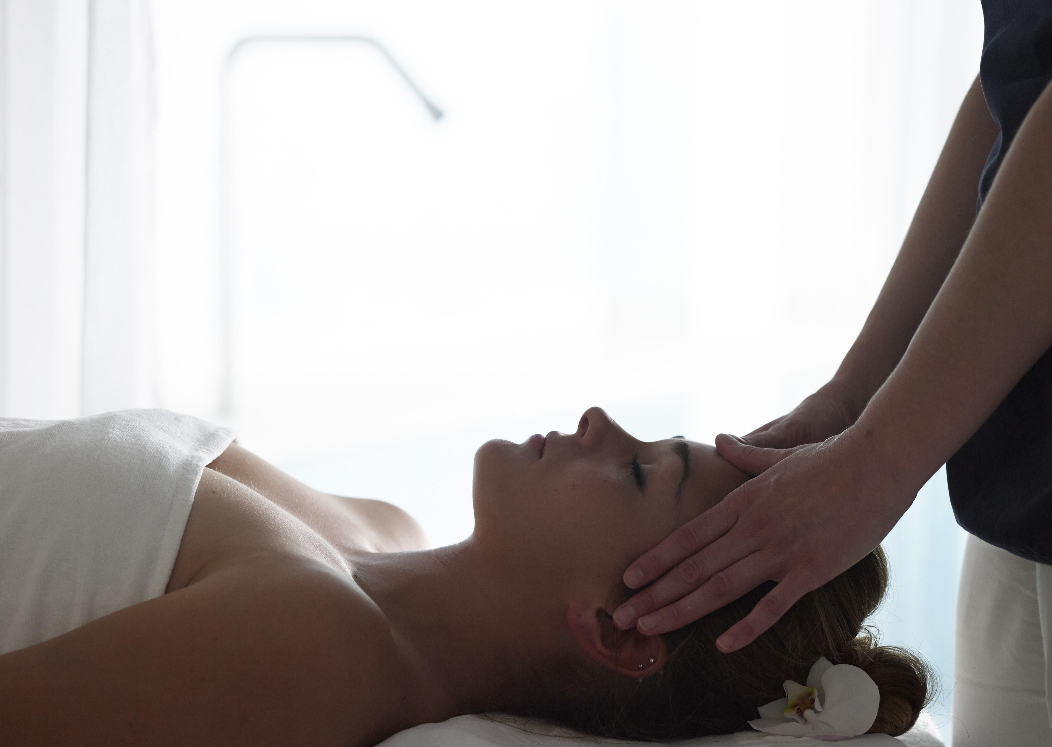 Grand Serai Congress And Spa Ioannina Exterior photo A woman receiving a head massage