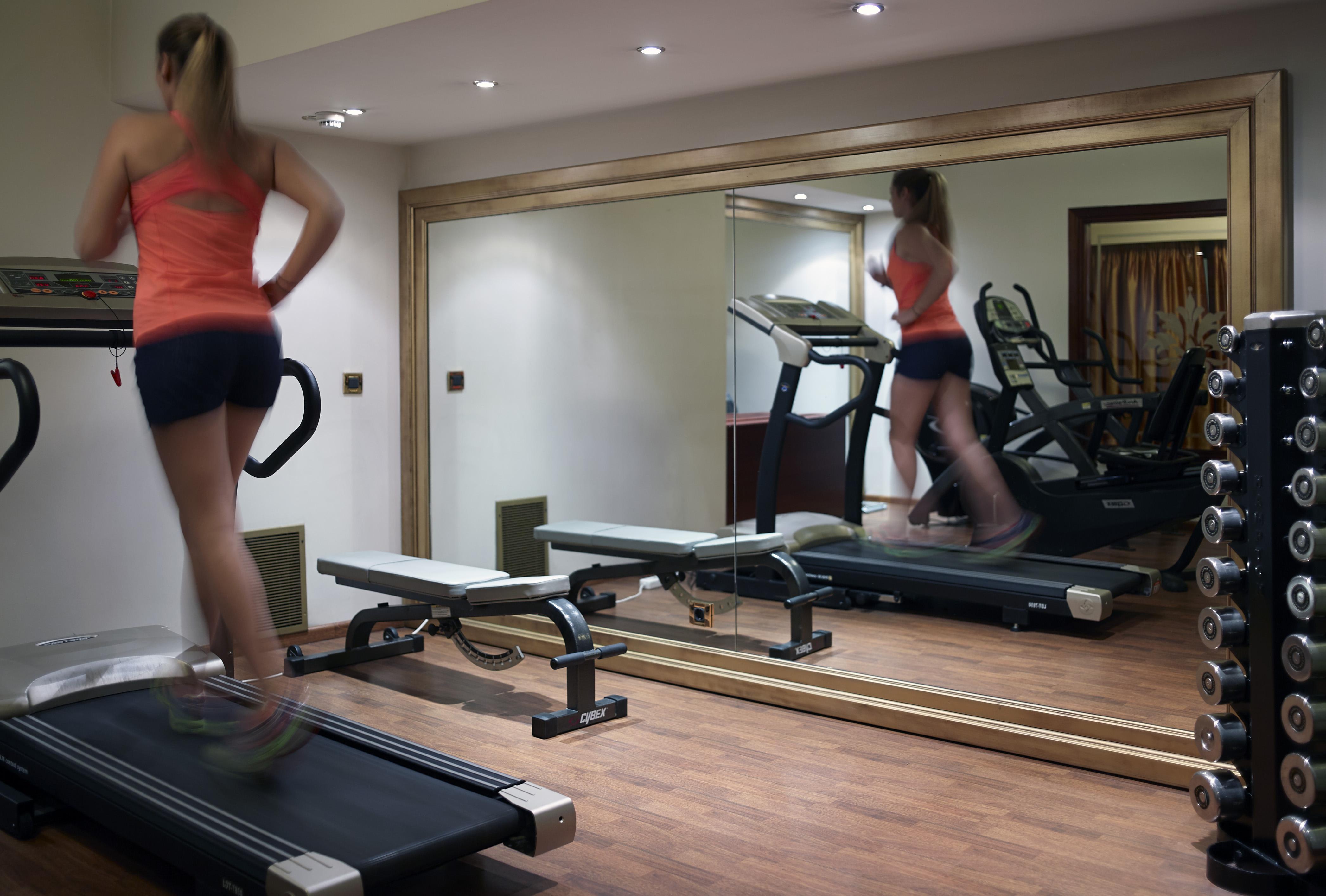 Grand Serai Congress And Spa Ioannina Exterior photo A woman exercising on a treadmill